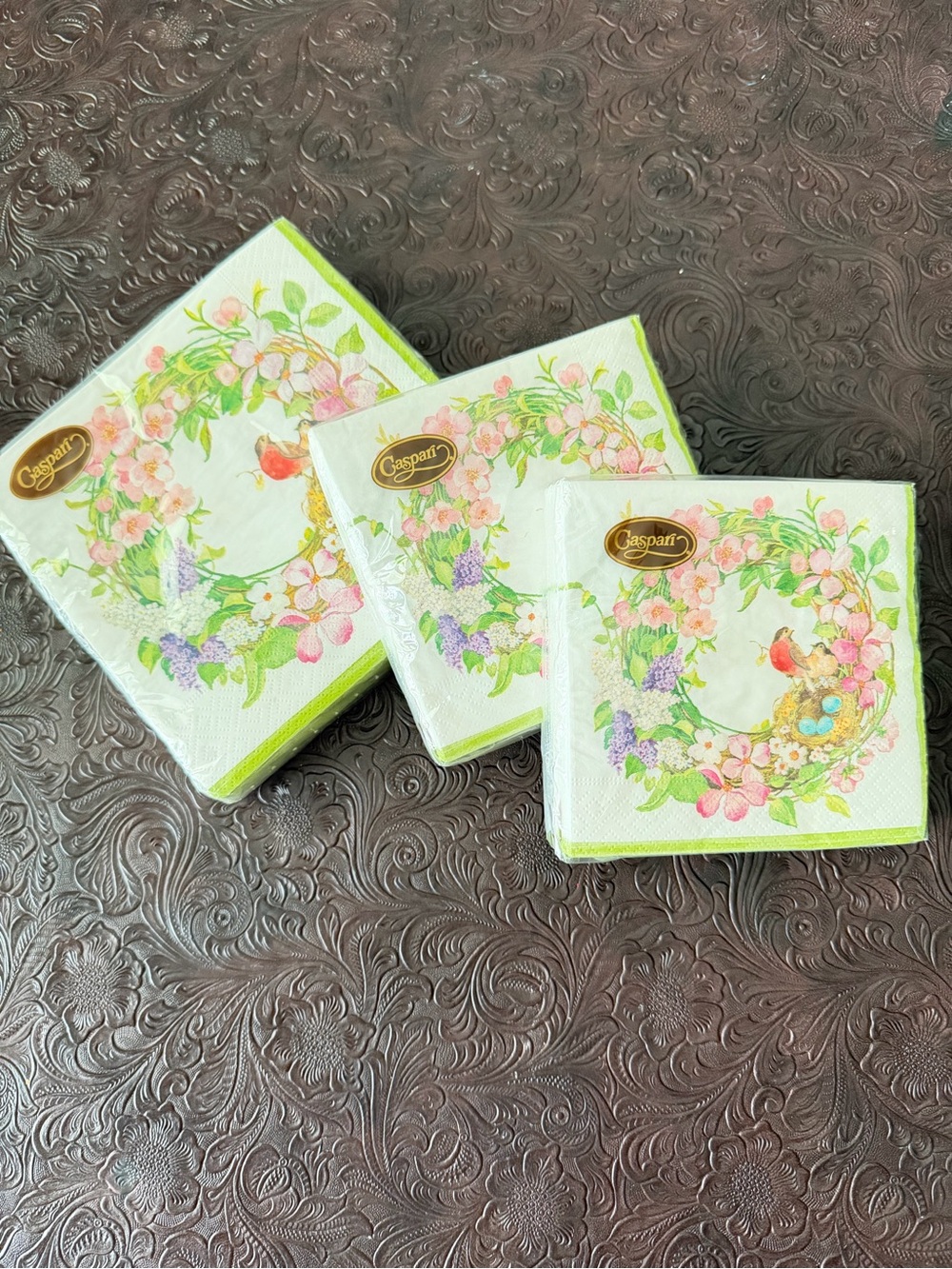 Three packages of Caspari napkins. 1 lunch 2 cocktail Floral Bird Paper Napkins